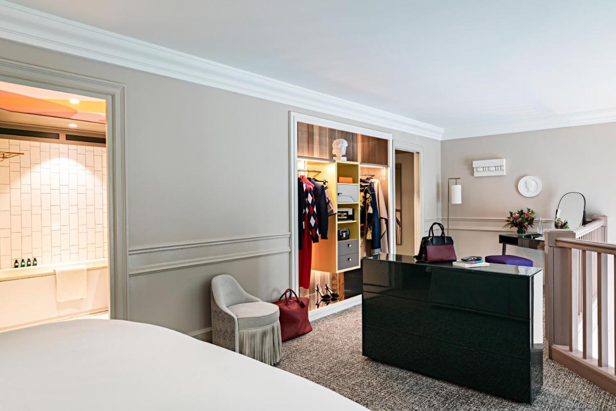 Un ou plusieurs lits dans un hébergement de l'établissement Sofitel Le Scribe Paris Opera