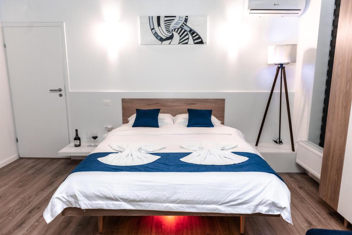 Puzzle Apartaments&Studios - Housity
