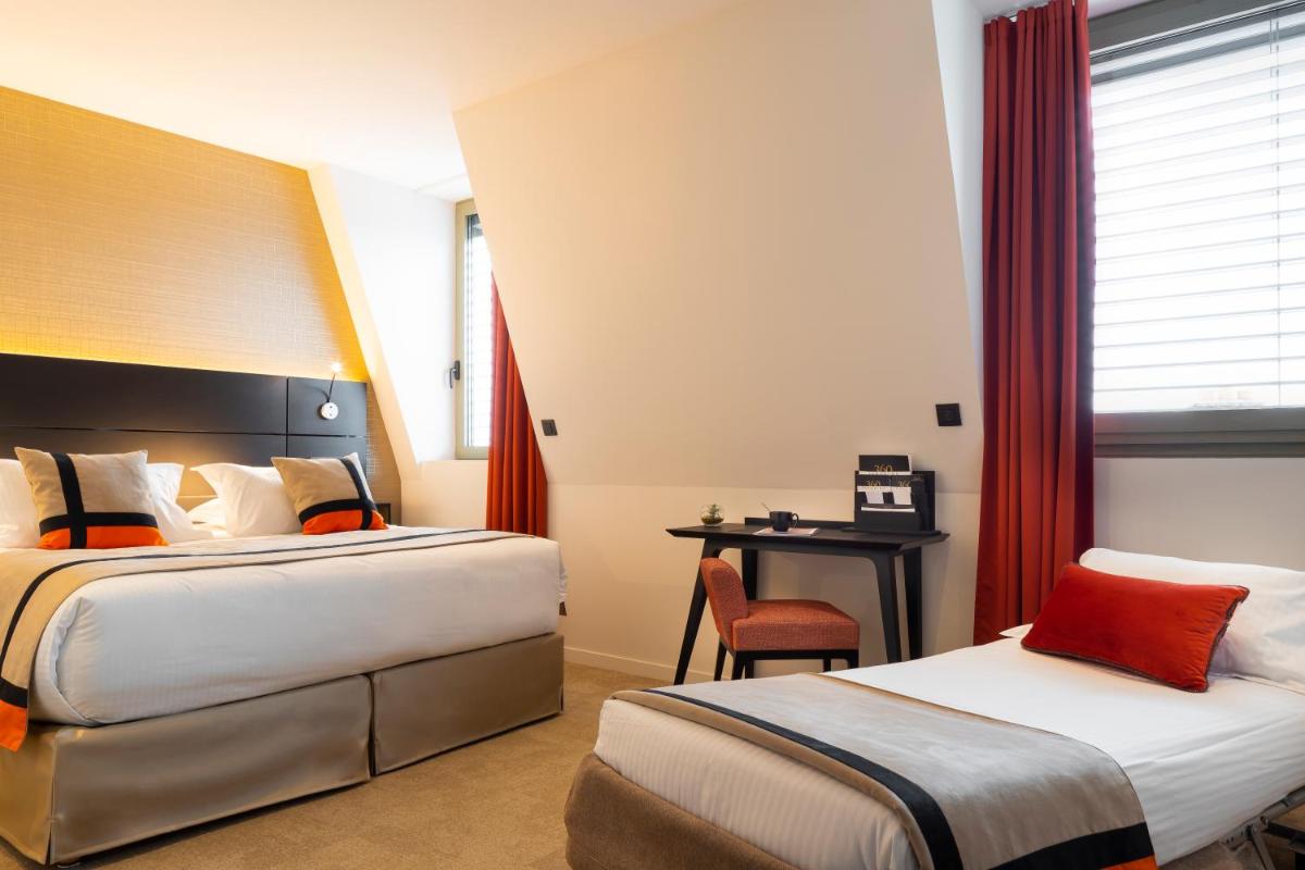 Un ou plusieurs lits dans un hébergement de l'établissement HÔTEL & SPA Panorama 360