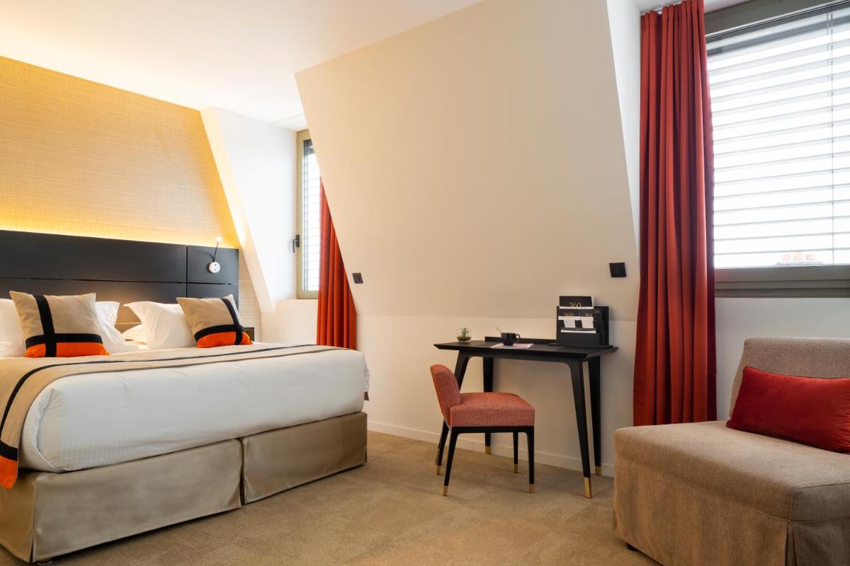 Un ou plusieurs lits dans un hébergement de l'établissement HÔTEL & SPA Panorama 360