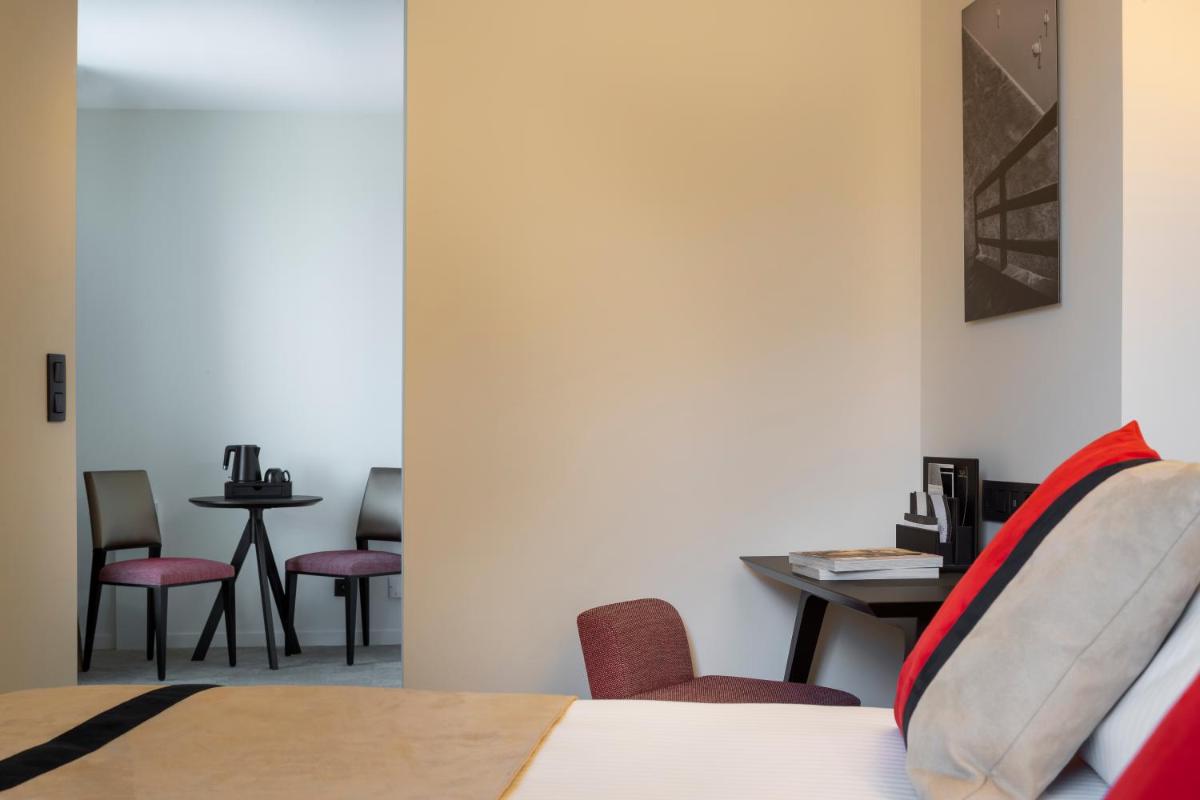 Coin salon dans l'établissement HÔTEL & SPA Panorama 360