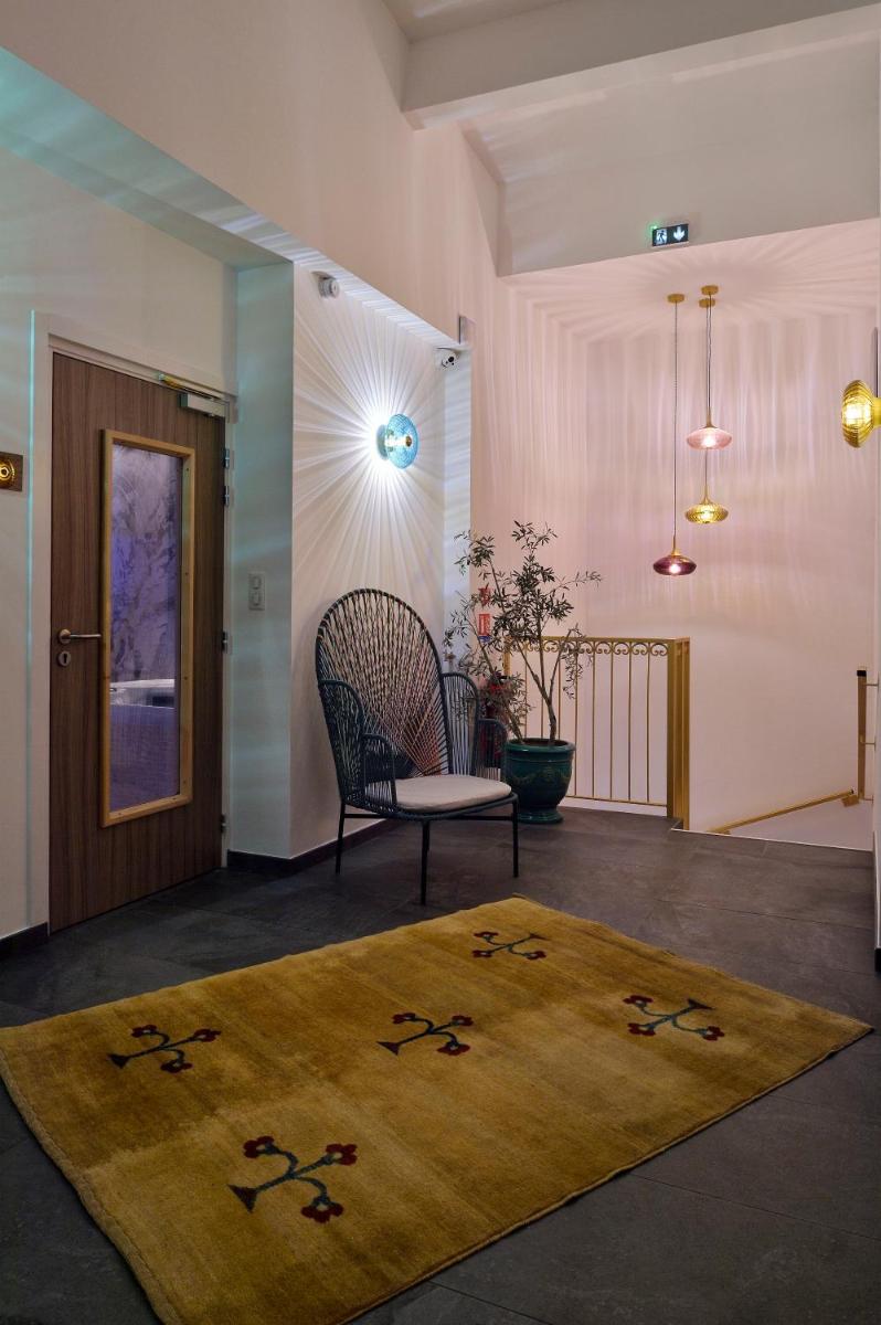 Coin salon dans l'établissement Hôtel Fesch & Spa