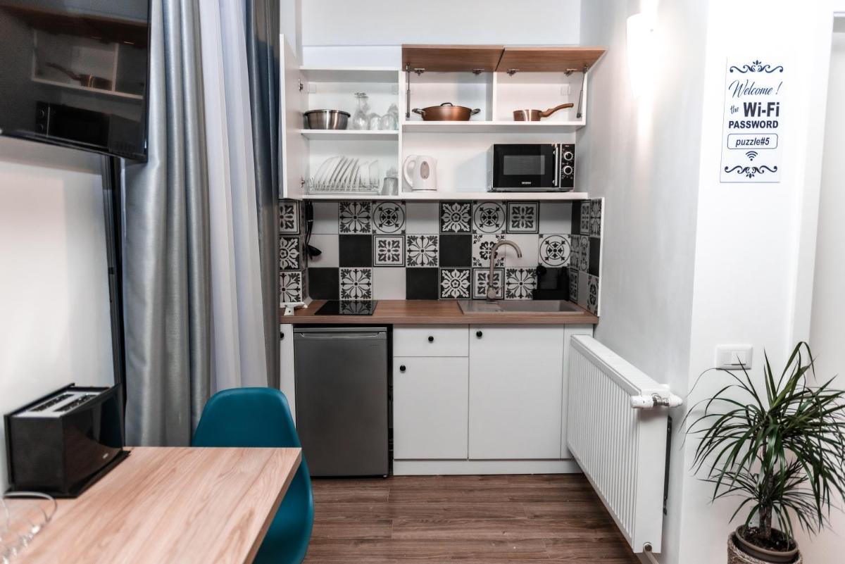 Puzzle Apartaments&Studios - Housity