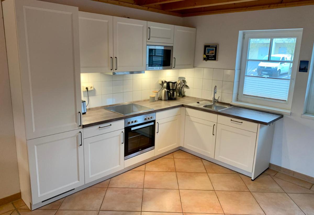 Ferienhaus mit Bootssteg am See in Rheinsberg - Housity