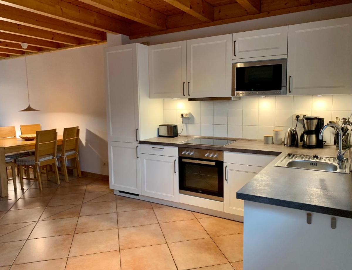 Ferienhaus mit Bootssteg am See in Rheinsberg - Housity