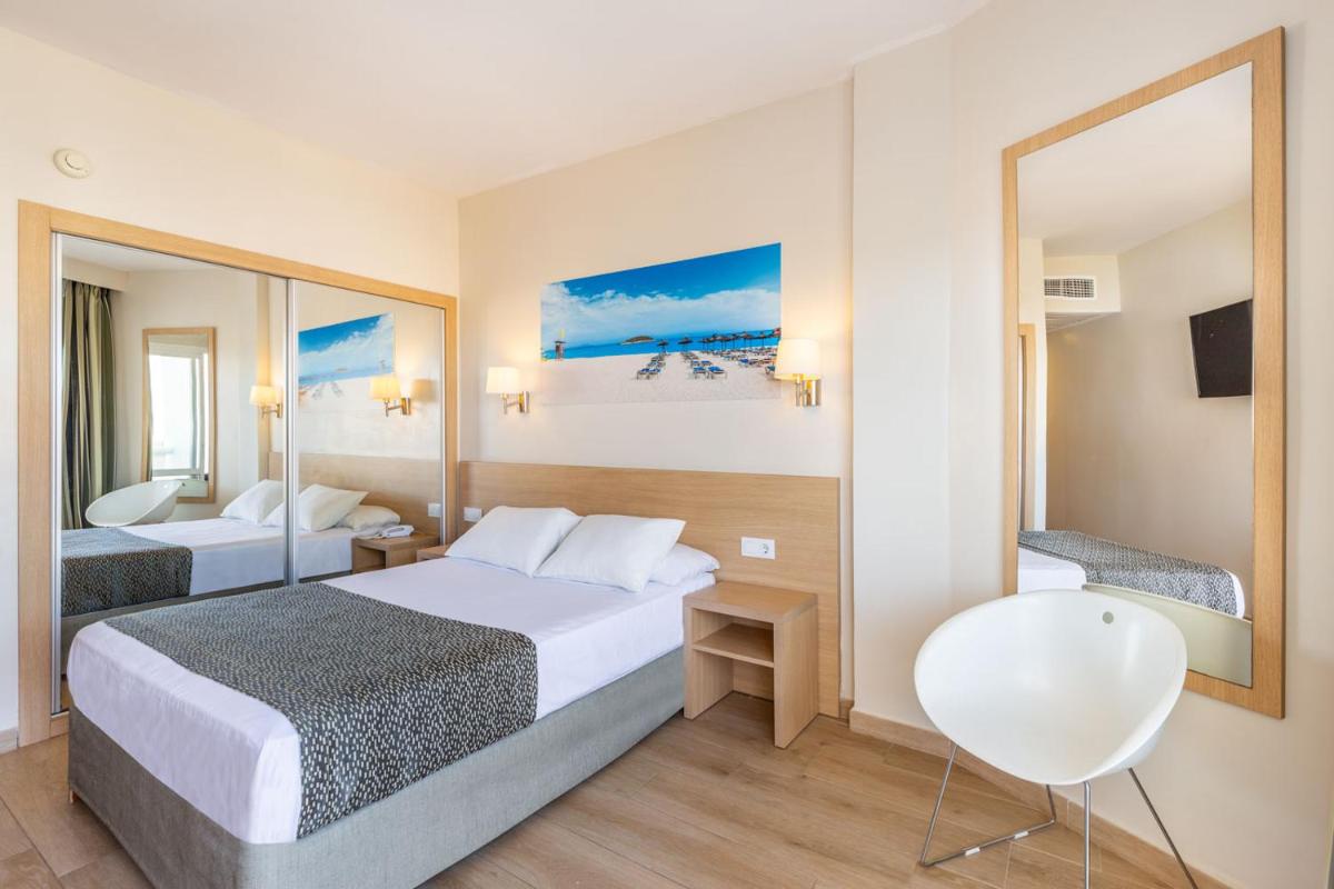 Cama o camas de una habitación en Hotel Samos