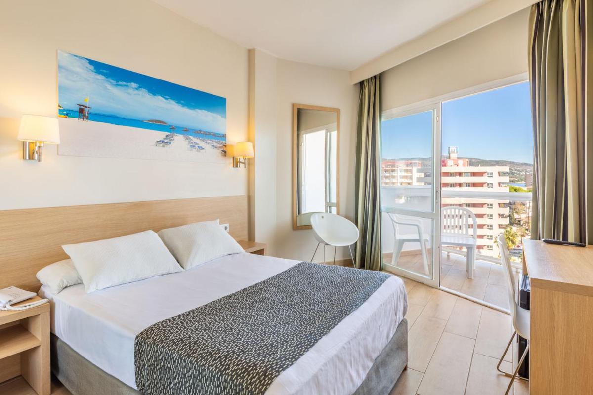 Cama o camas de una habitación en Hotel Samos