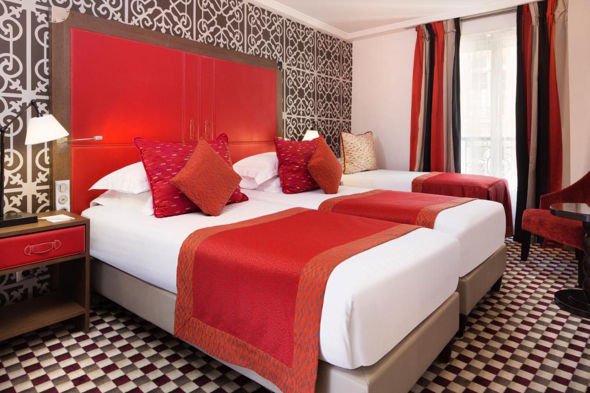 Un ou plusieurs lits dans un hébergement de l'établissement Hotel Phileas Lazare & Spa - Opera