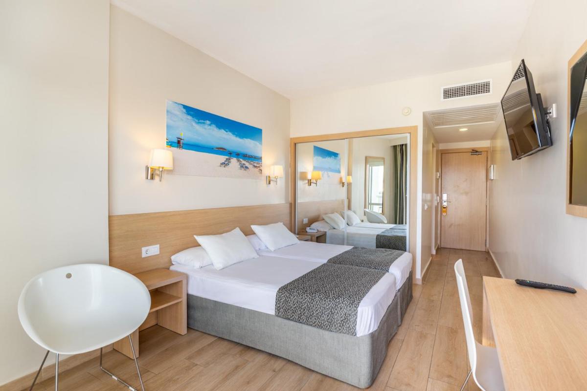 Cama o camas de una habitación en Hotel Samos