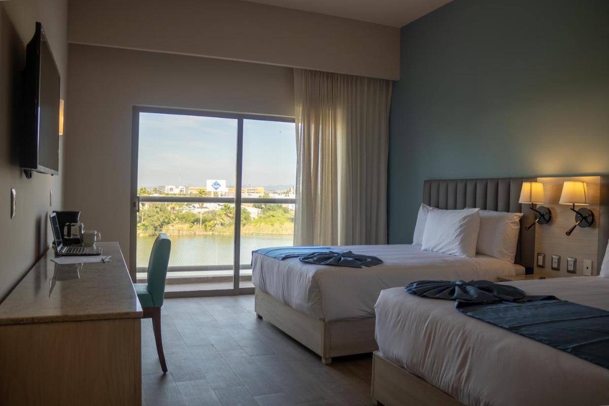 Suitetrails - Varali Grand Hotel
