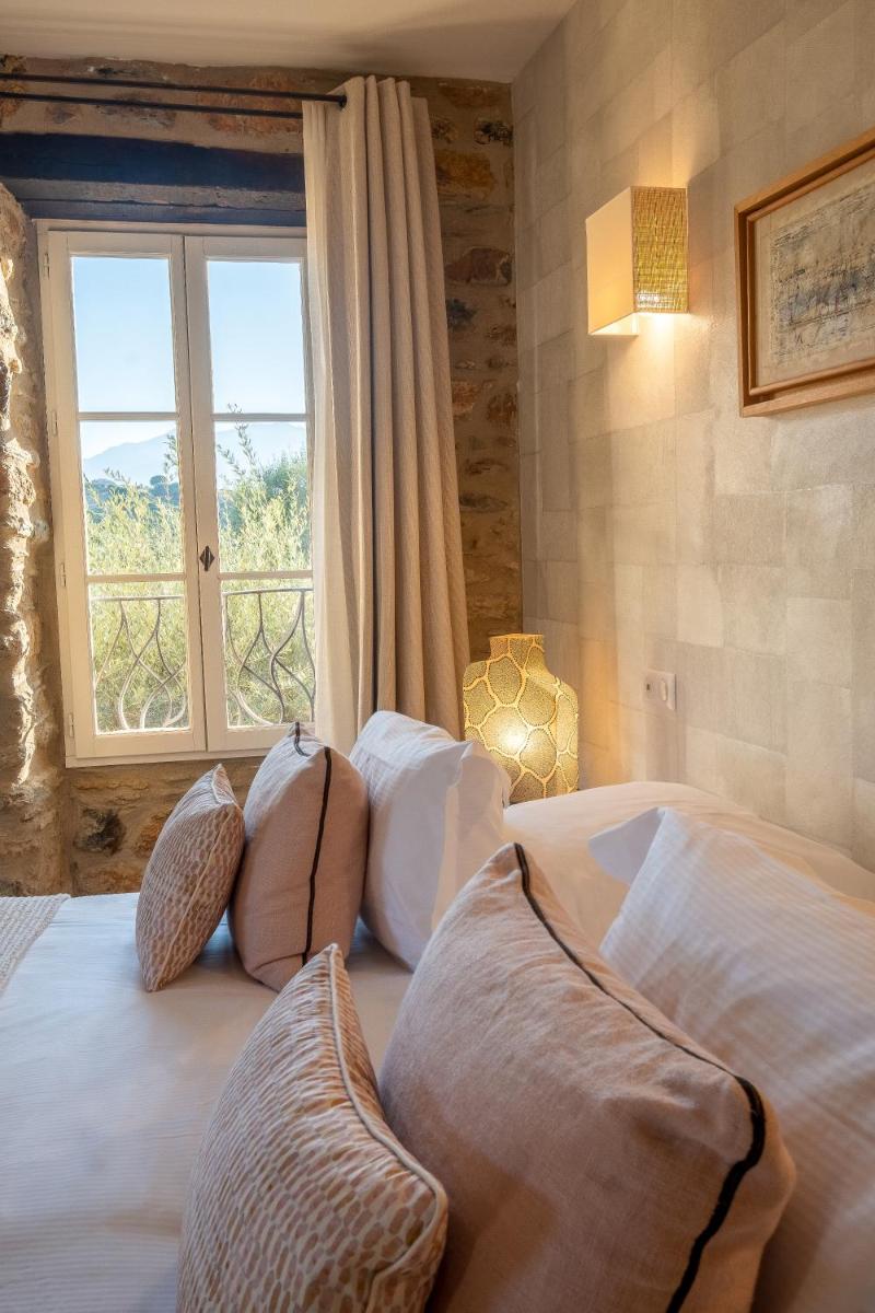 Un ou plusieurs lits dans un hébergement de l'établissement Hôtel La Dimora & Spa