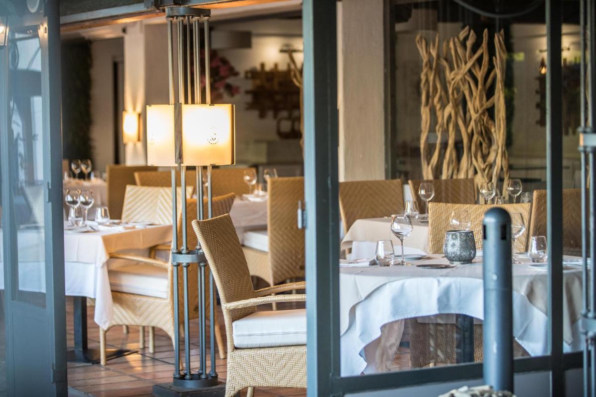 Restaurant ou autre lieu de restauration dans l'établissement Hôtel Le Roi Théodore & Spa