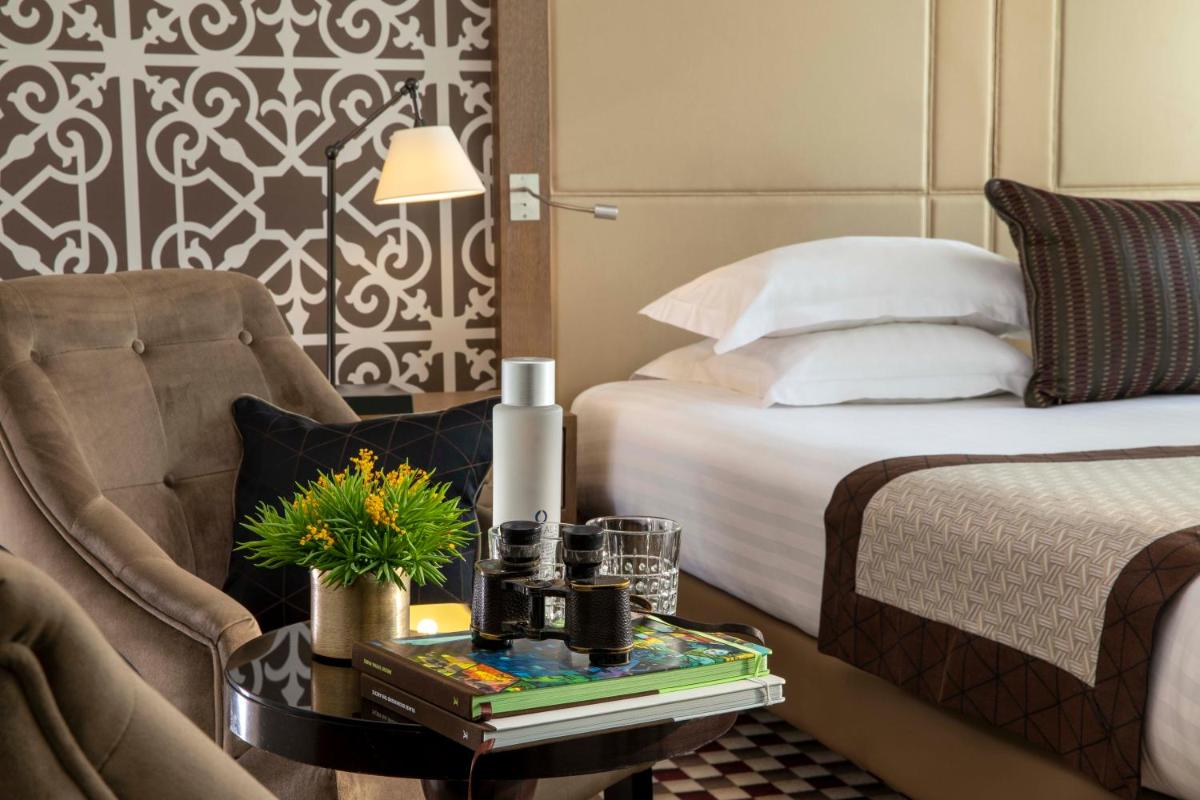 Un ou plusieurs lits dans un hébergement de l'établissement Hotel Phileas Lazare & Spa - Opera