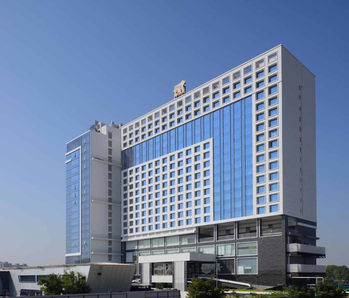 a tall building with a lot of windows at Taj Skyline Ahmedabad in Ahmedabad