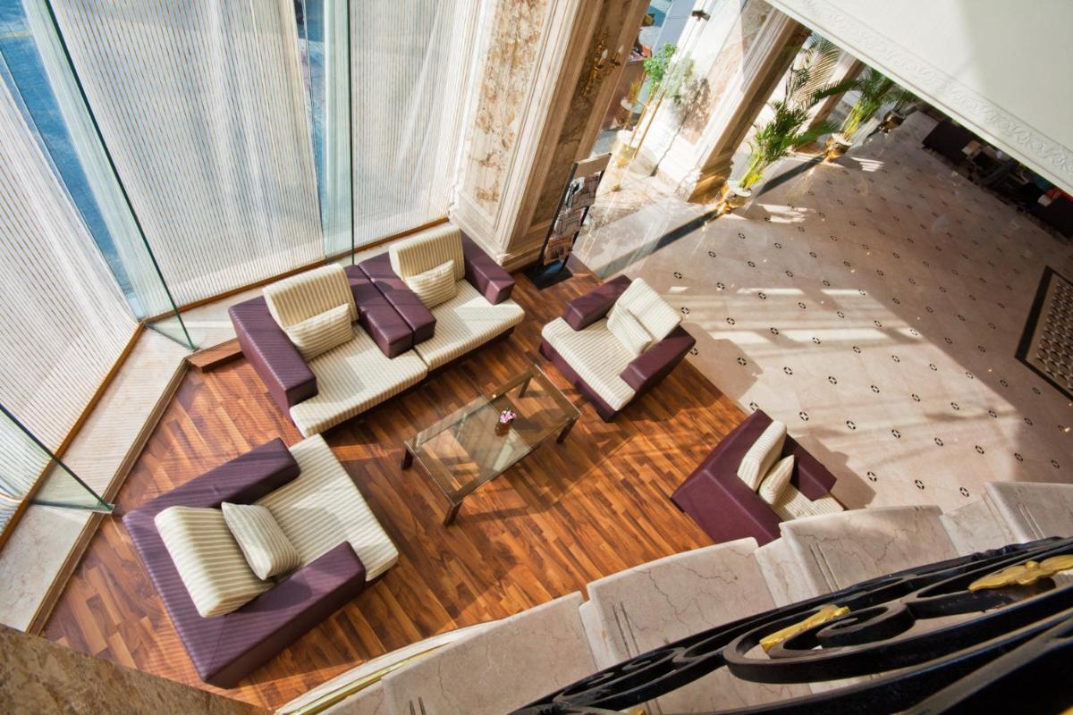 an overhead view of a room with chairs and a table at The Accord Metropolitan in Chennai