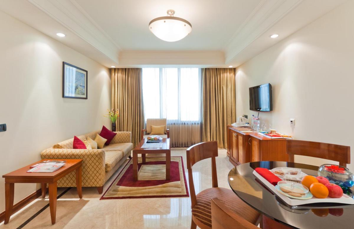 a living room with a couch and a table at The Accord Metropolitan in Chennai
