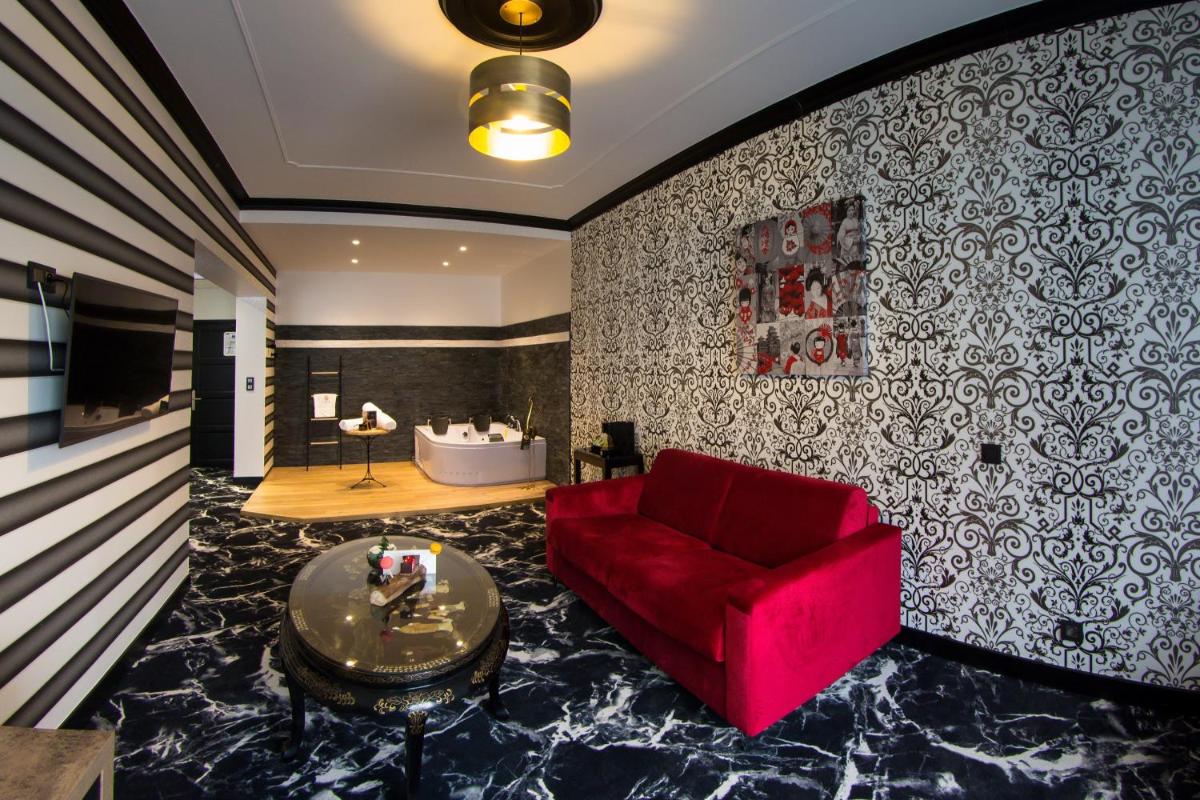 Coin salon dans l'établissement Hôtel du Barry Resort & Spa