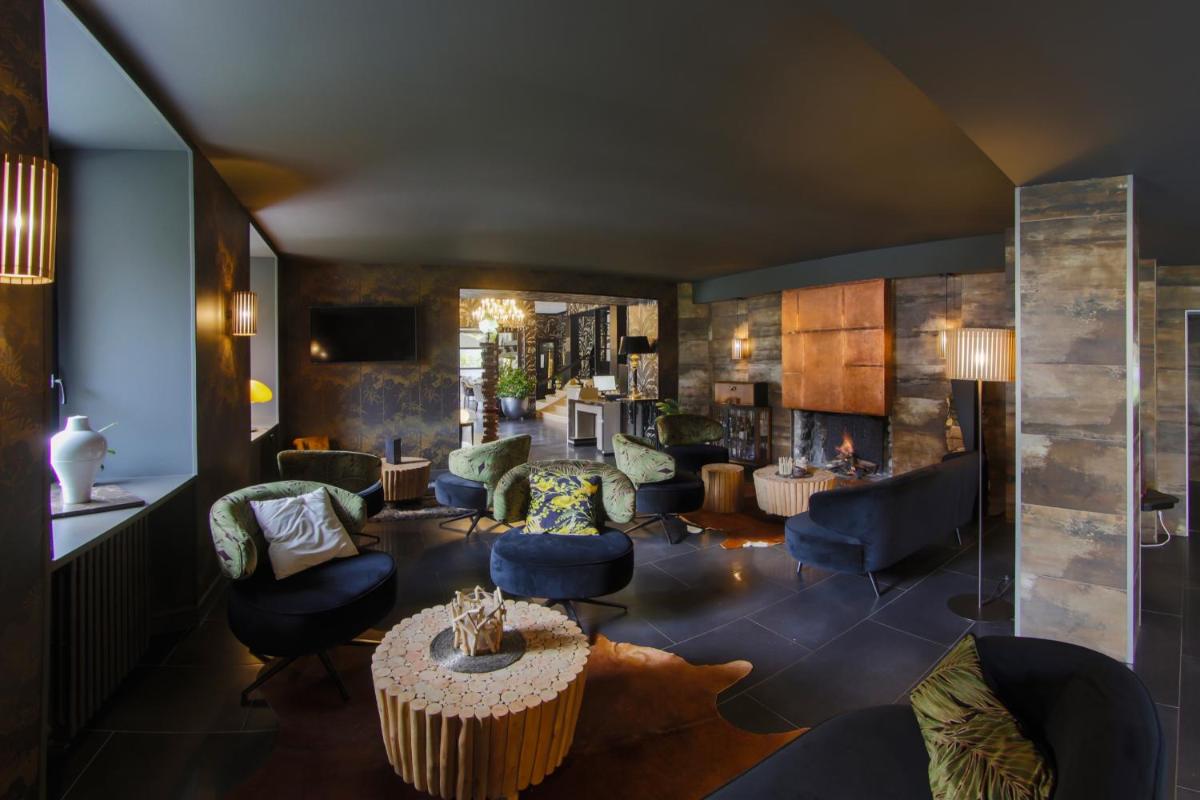 Coin salon dans l'établissement Hôtel du Barry Resort & Spa