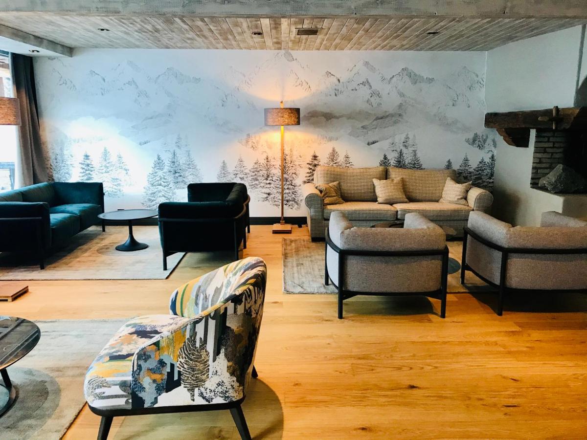 Coin salon dans l'établissement Grand Hôtel Courchevel 1850