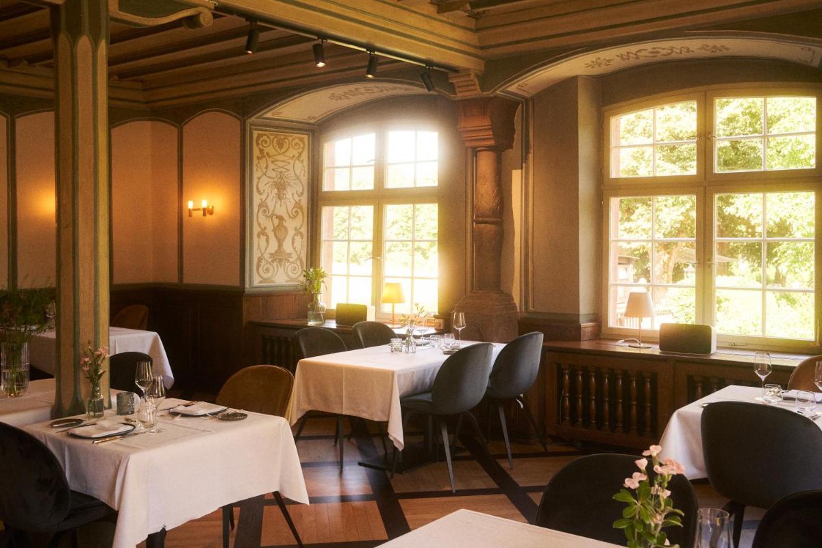 Gästehaus am Wasserschloss & Restaurant Wasserschloss Inzlingen - Housity