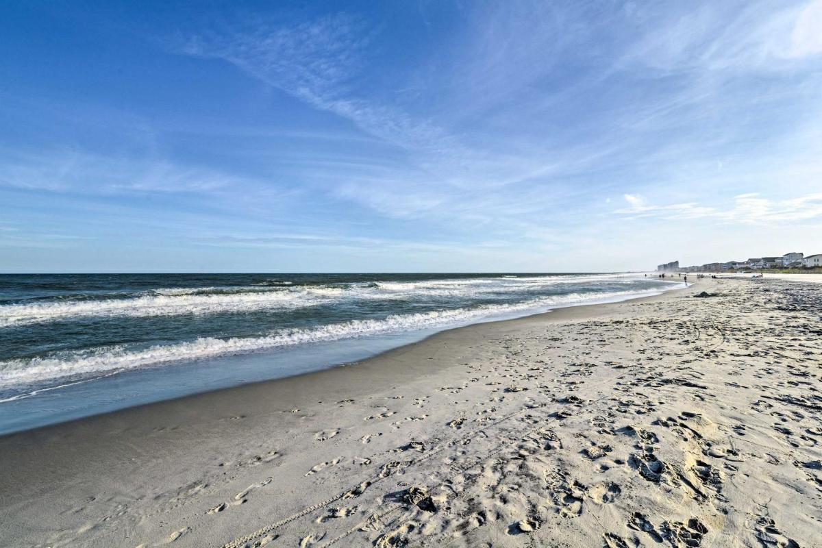 Walk to Surfside Beach Studio with Covered Balcony - Housity