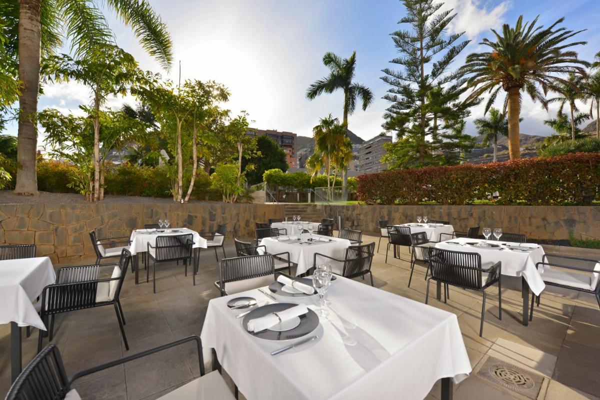 Un restaurante o sitio para comer en Iberostar Heritage Grand Mencey