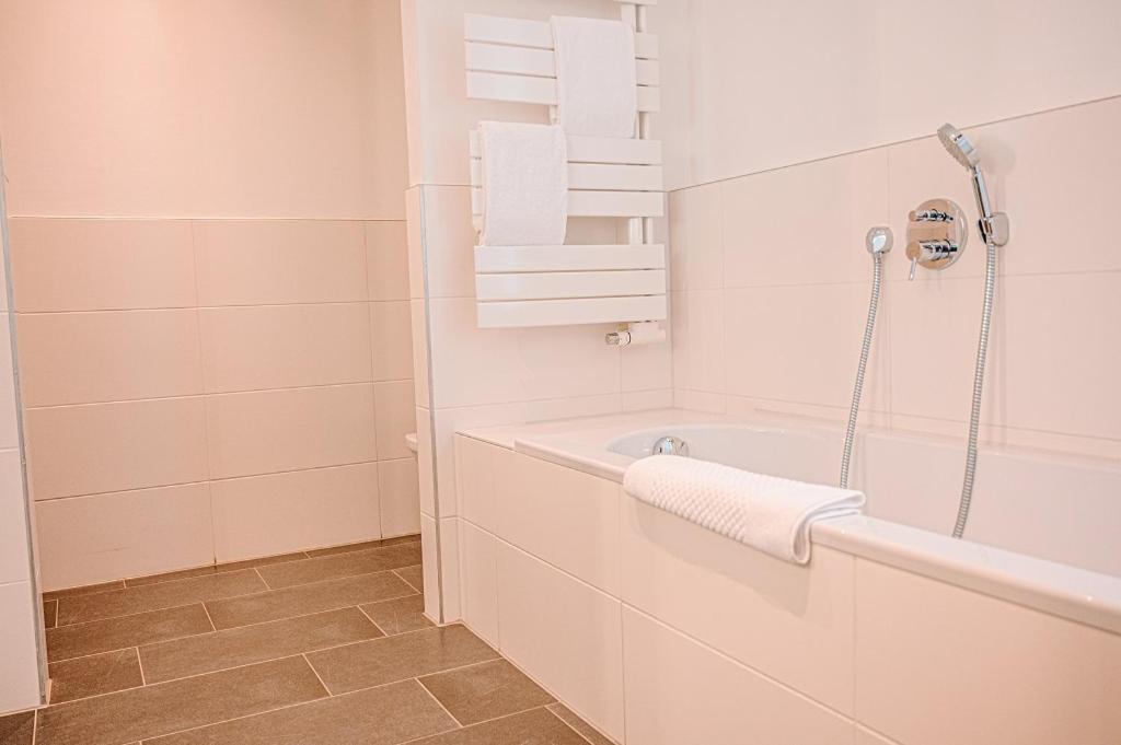 Ein Badezimmer in der Unterkunft THE GRAND Ahrenshoop