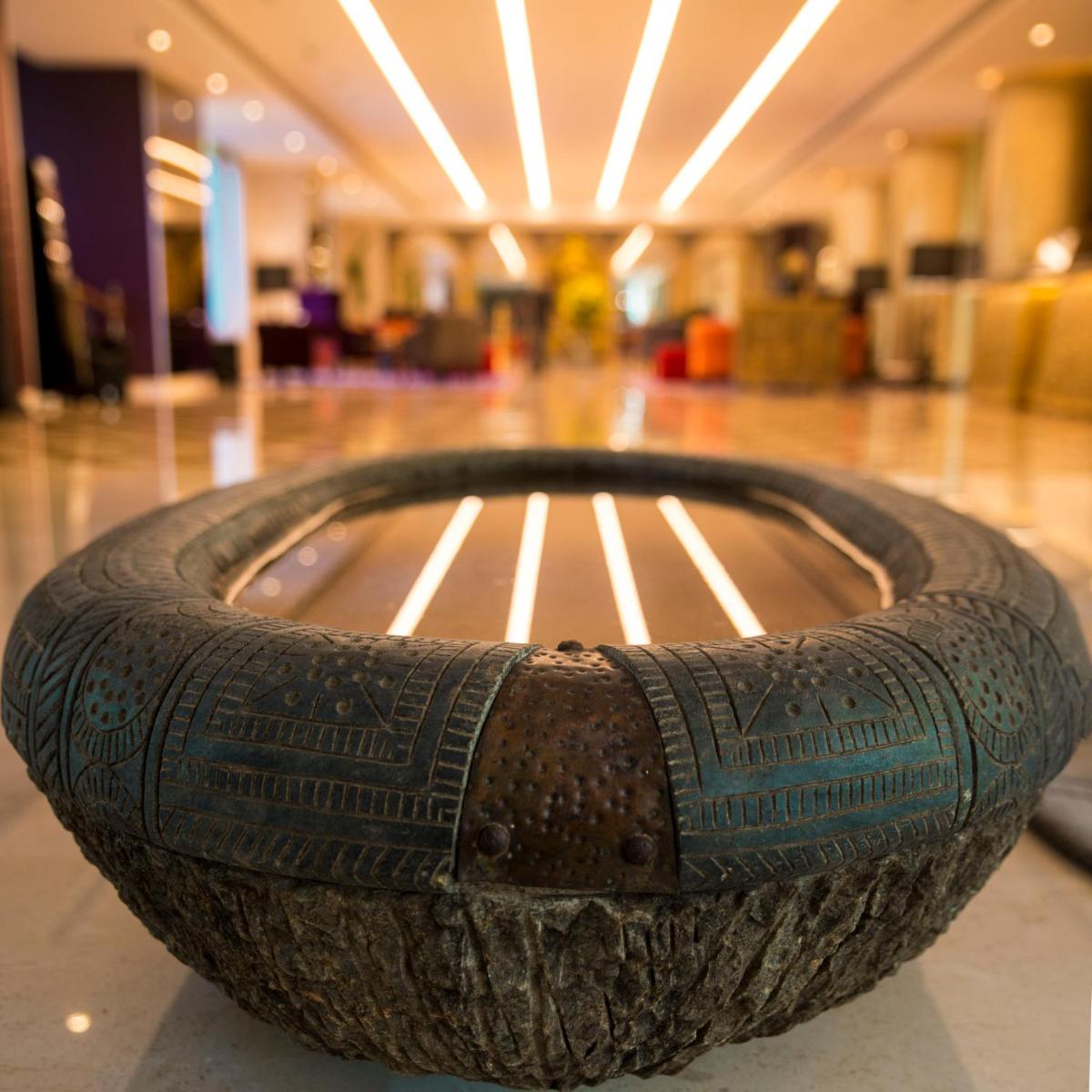 a large tire sitting on the floor of a building at Grand Mercure Bengaluru at Gopalan Mall - An Accor Brand in Bengaluru a large tire sitting on the floor of a building at Grand Mercure Bengaluru at Gopalan Mall - An Accor Brand in Bengaluru