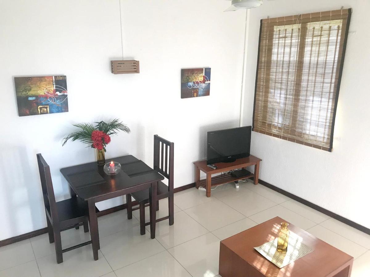 Quiet apartment in Pereybere, 50 m² with shared pool - Housity