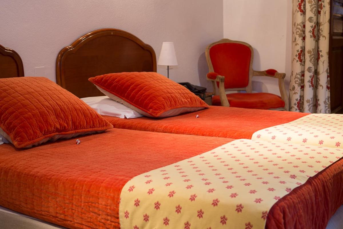Un ou plusieurs lits dans un hébergement de l'établissement Le Castellas Hotel & SPA - TERITORIA