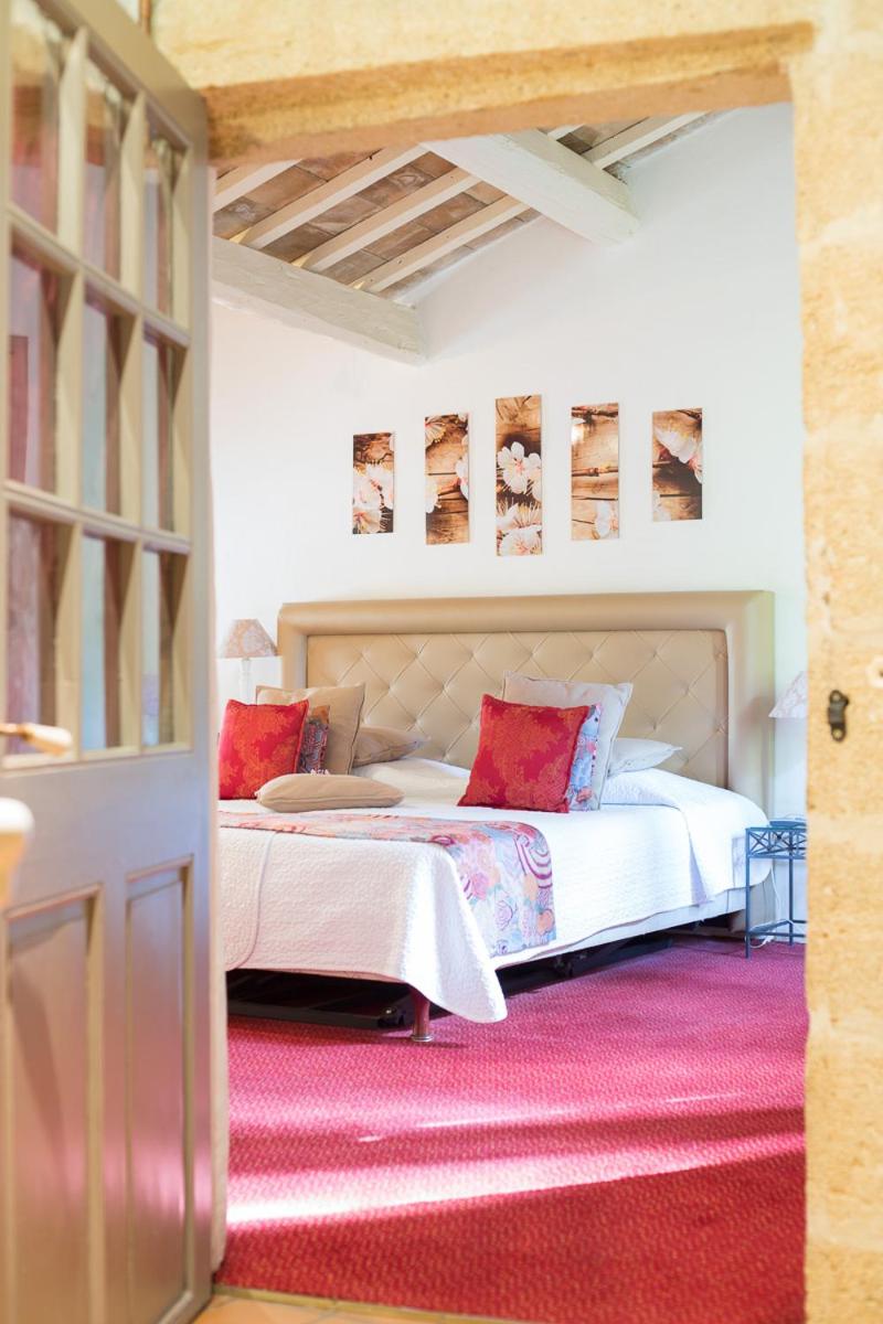Un ou plusieurs lits dans un hébergement de l'établissement Le Castellas Hotel & SPA - TERITORIA