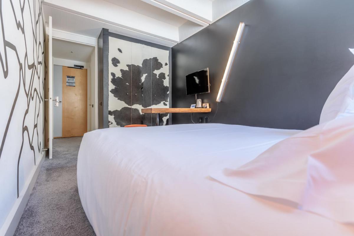 Un ou plusieurs lits dans un hébergement de l'établissement Totem, Friendly Hotel & Spa