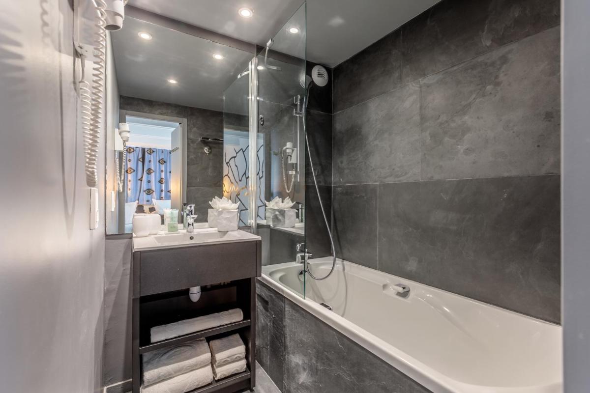 Salle de bains dans l'établissement Totem, Friendly Hotel & Spa