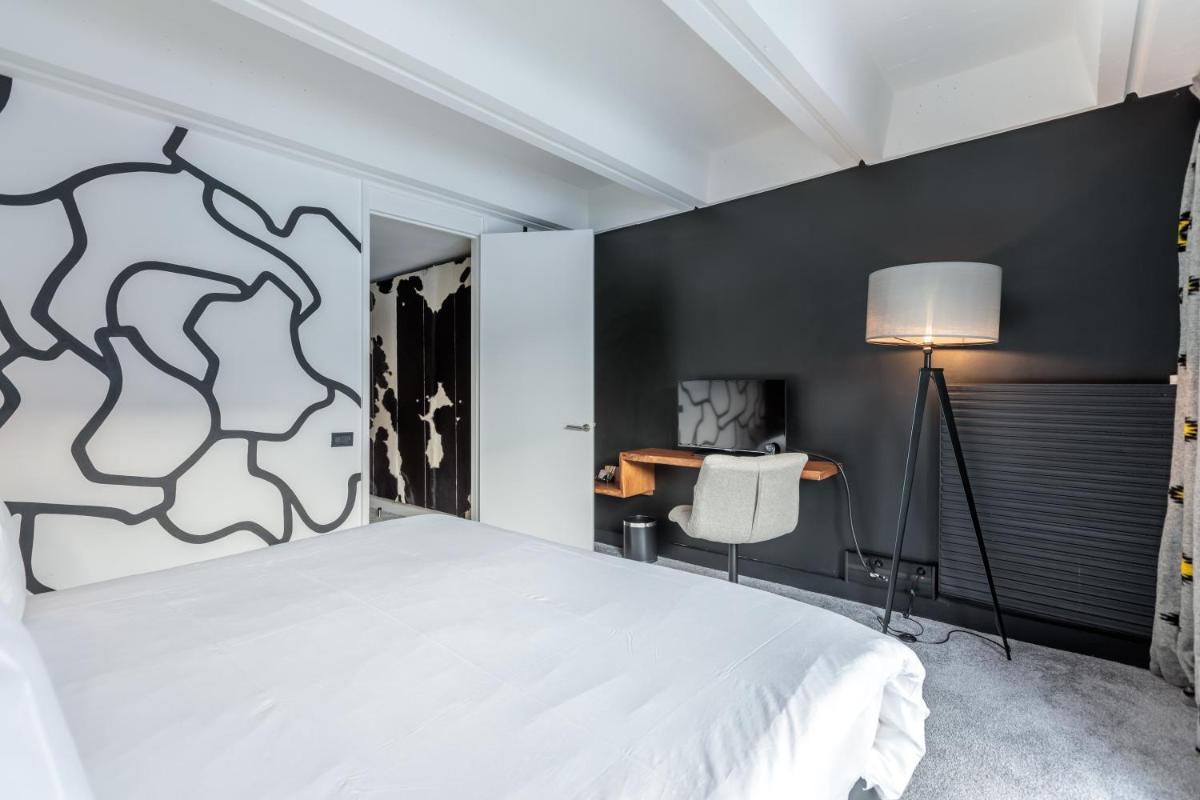 Un ou plusieurs lits dans un hébergement de l'établissement Totem, Friendly Hotel & Spa