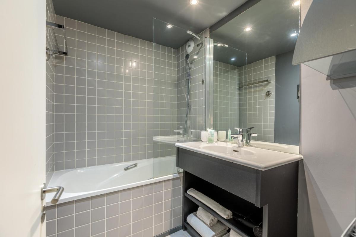 Salle de bains dans l'établissement Totem, Friendly Hotel & Spa