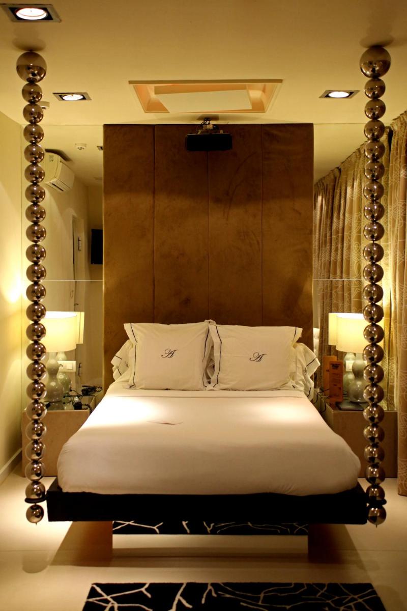 Cama o camas de una habitación en Abalú Design Boutique Hotel Gran Via