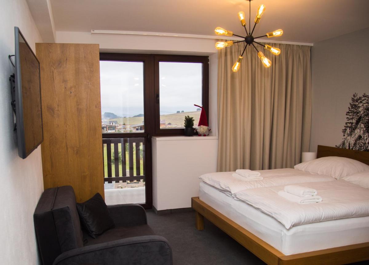 Snowland Apartmány - Housity