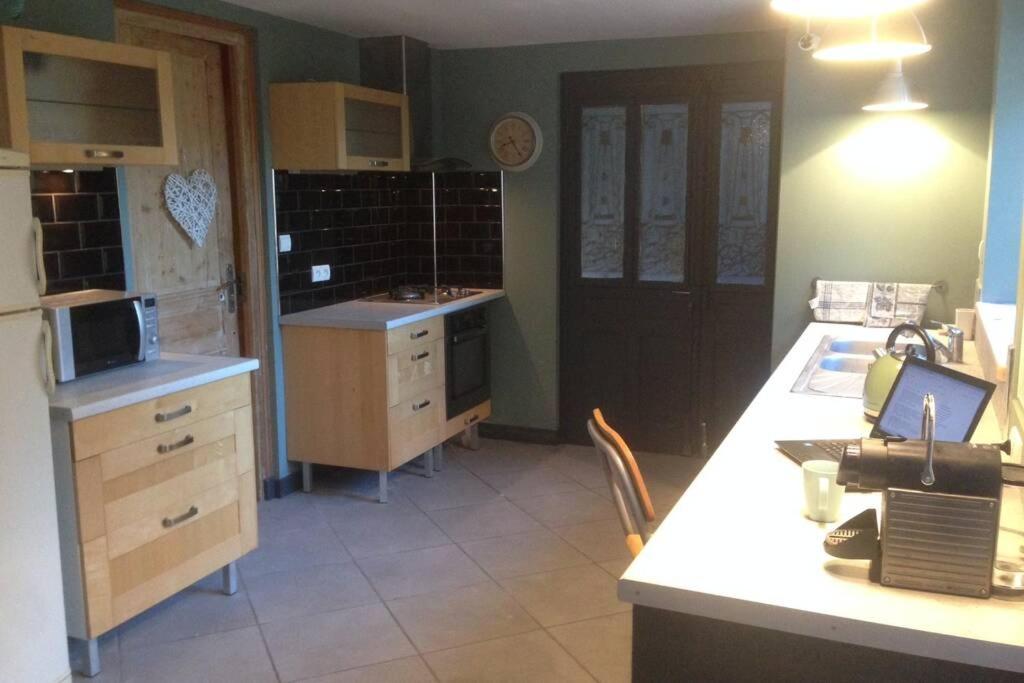 Suitetrails - Bel appartement en rez-de-jardin