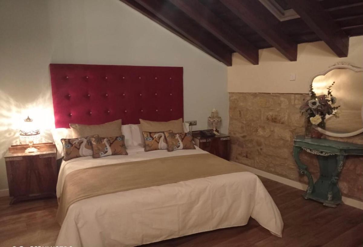 Cama o camas de una habitación en HOTEL CASABLANCA BOUTIQUE