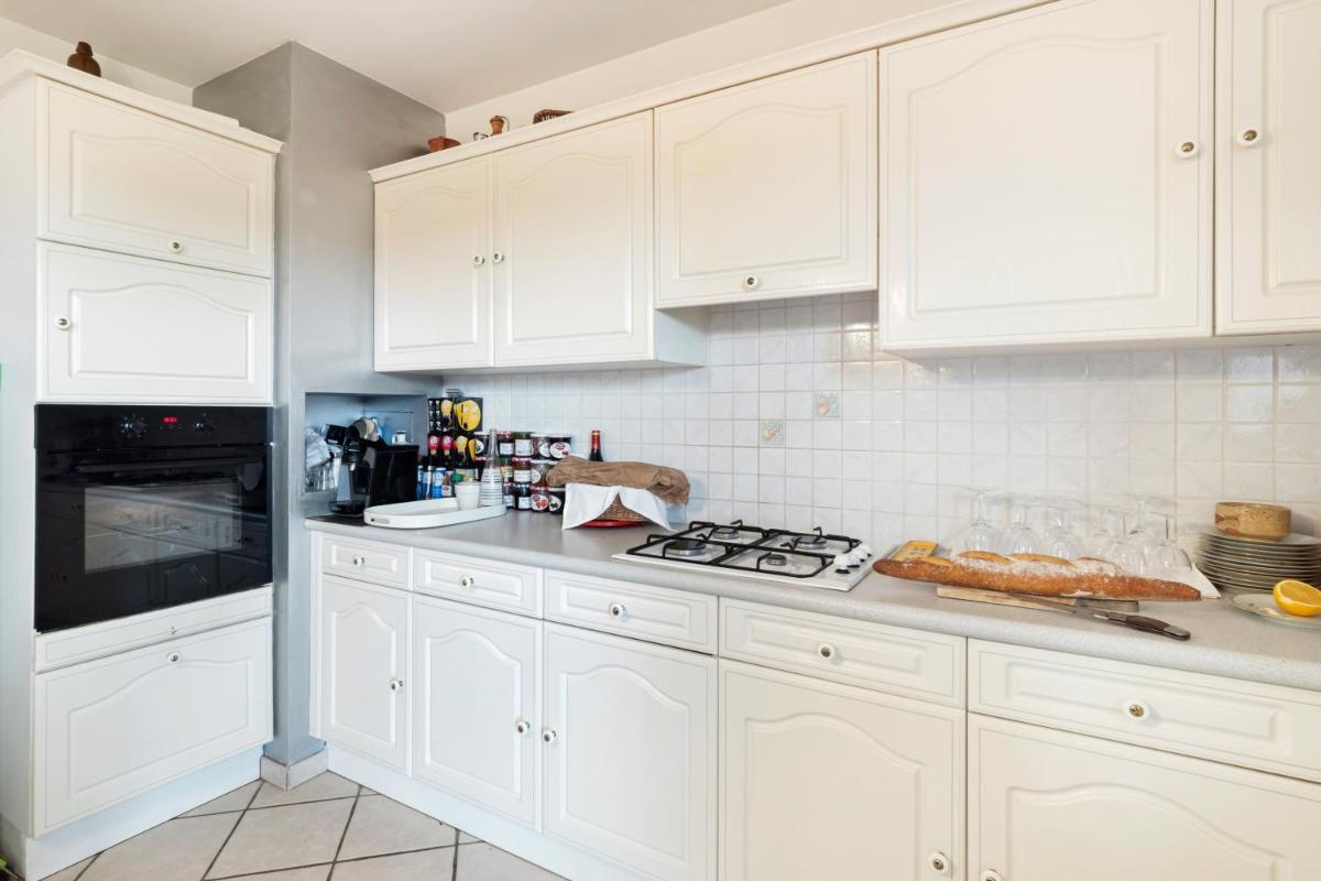 Maison chaleureuse Saint Cyr sur le Rhone - Housity