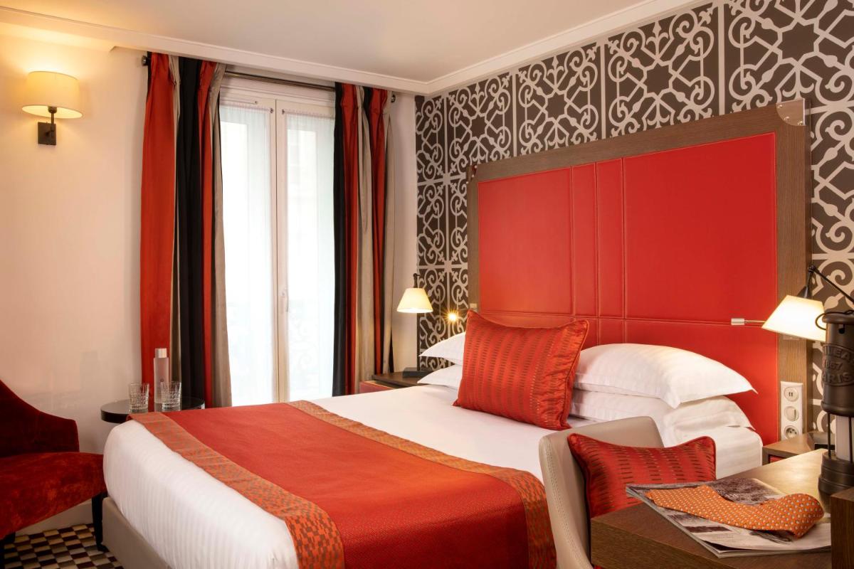 Un ou plusieurs lits dans un hébergement de l'établissement Hotel Phileas Lazare & Spa - Opera