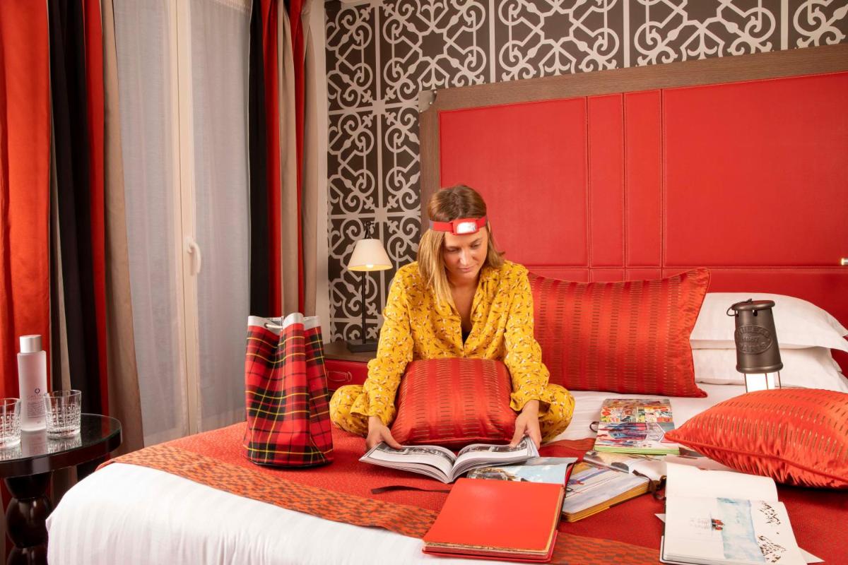 Un ou plusieurs lits dans un hébergement de l'établissement Hotel Phileas Lazare & Spa - Opera