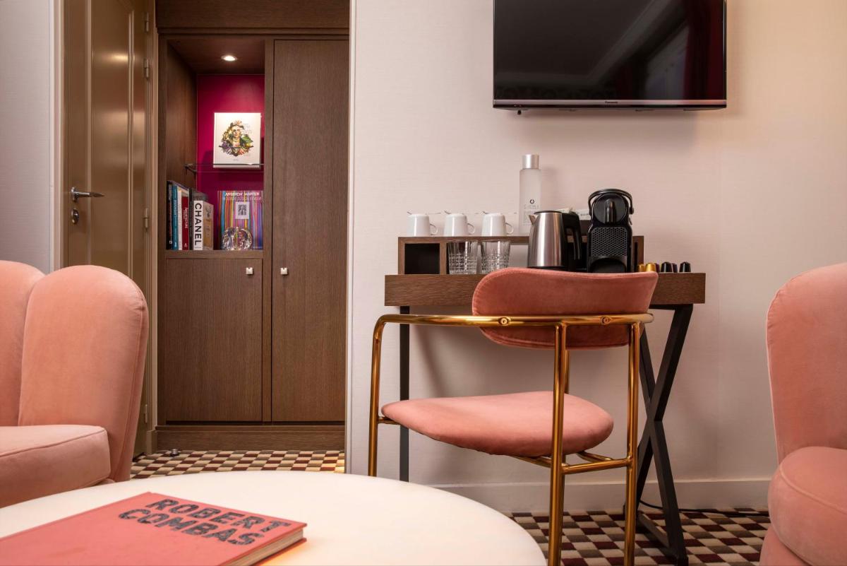 Télévision ou salle de divertissement dans l'établissement Hotel Phileas Lazare & Spa - Opera