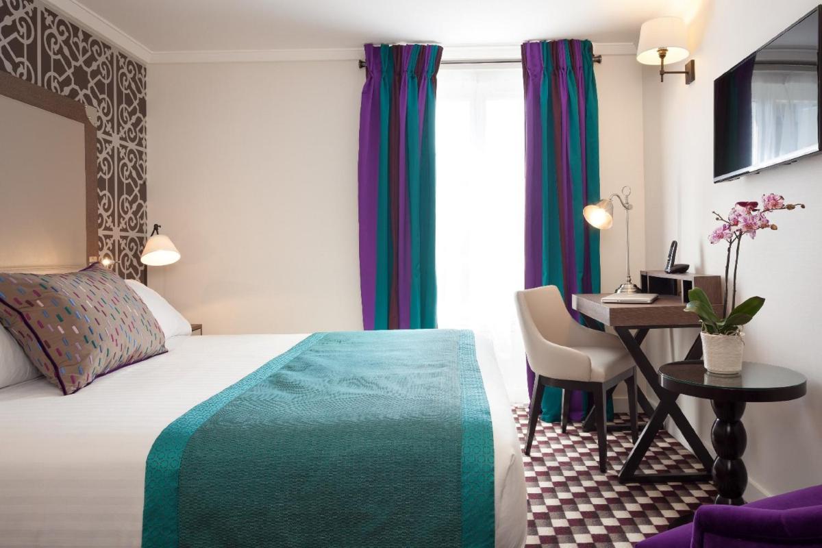 Un ou plusieurs lits dans un hébergement de l'établissement Hotel Phileas Lazare & Spa - Opera