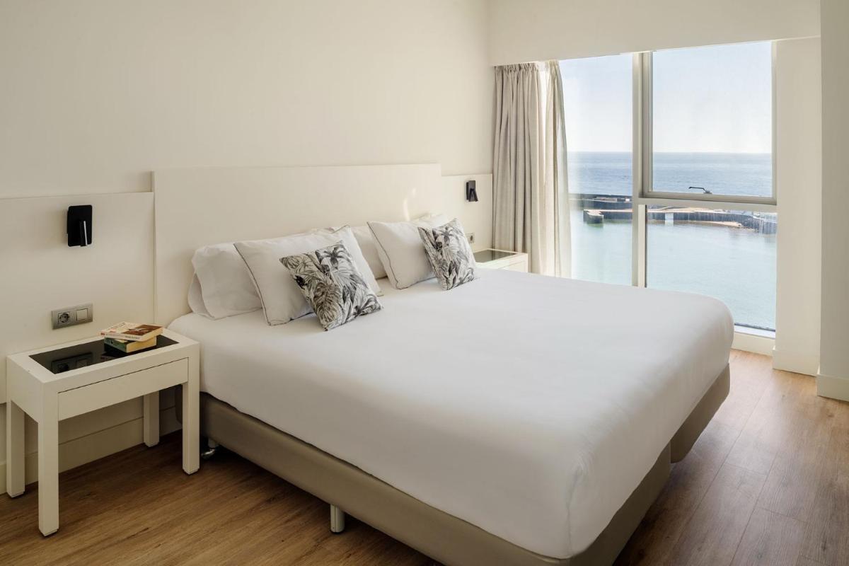 Cama o camas de una habitación en Arrecife Gran Hotel & Spa