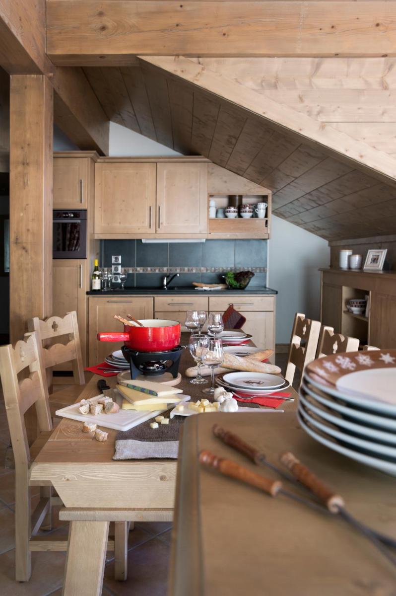 Cuisine ou kitchenette dans l'établissement CGH Résidence Boutique Le Chalet des Dolines