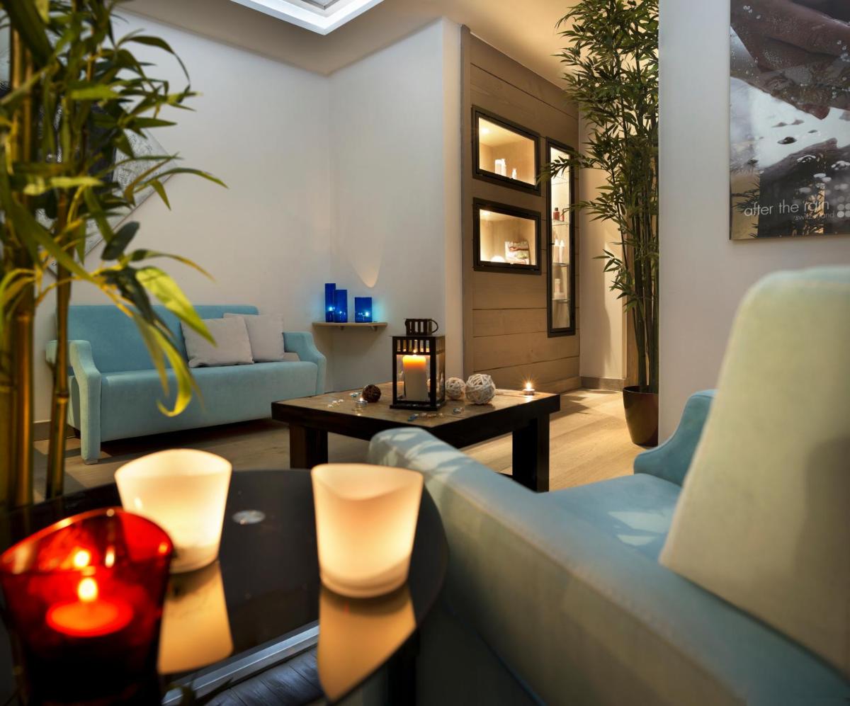 Coin salon dans l'établissement CGH Résidence Boutique Le Chalet des Dolines
