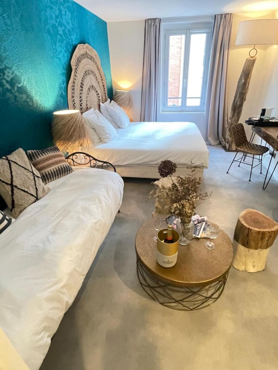 Un ou plusieurs lits dans un hébergement de l'établissement La Finca Hôtel & Spa