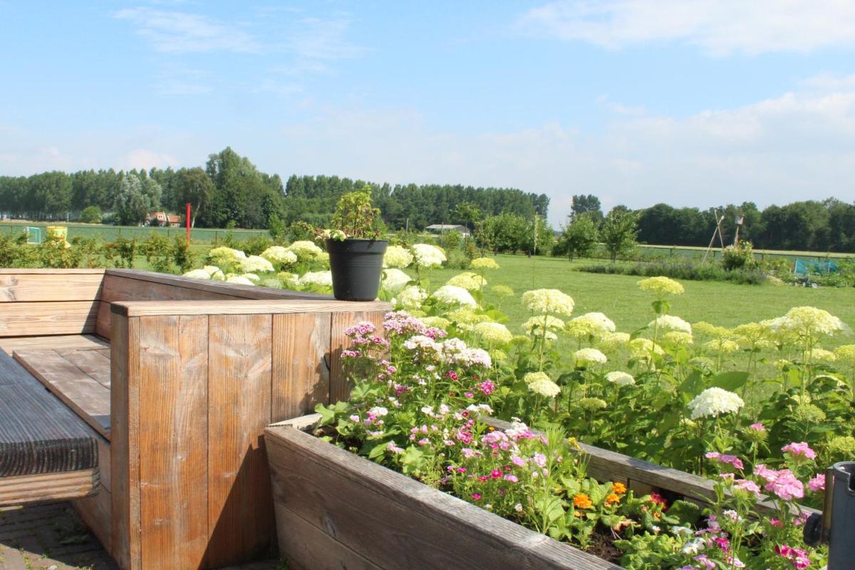 Landelijk slapen bij molen in Ovezande 4C - Housity