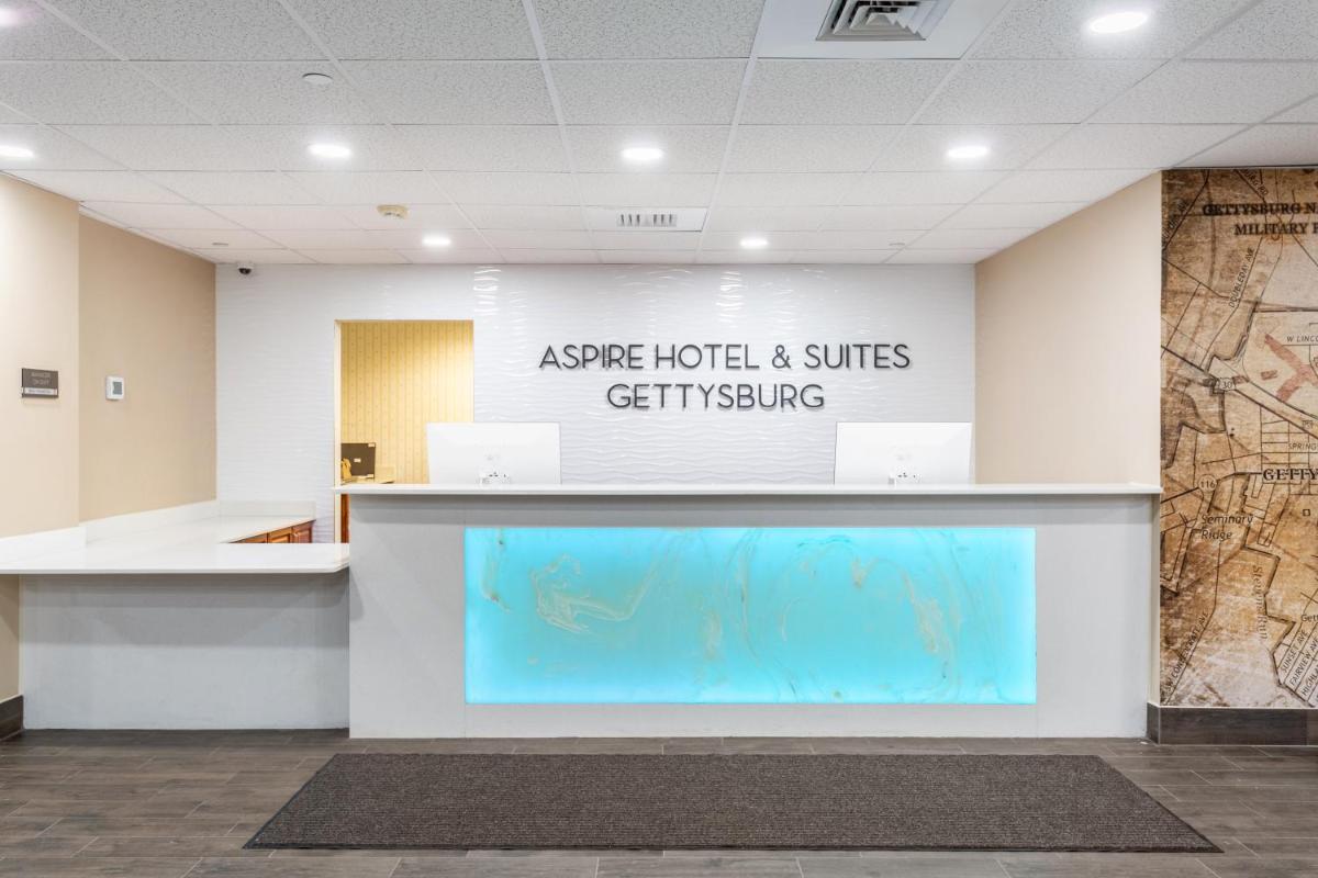 Aspire Hotel and Suites - Housity